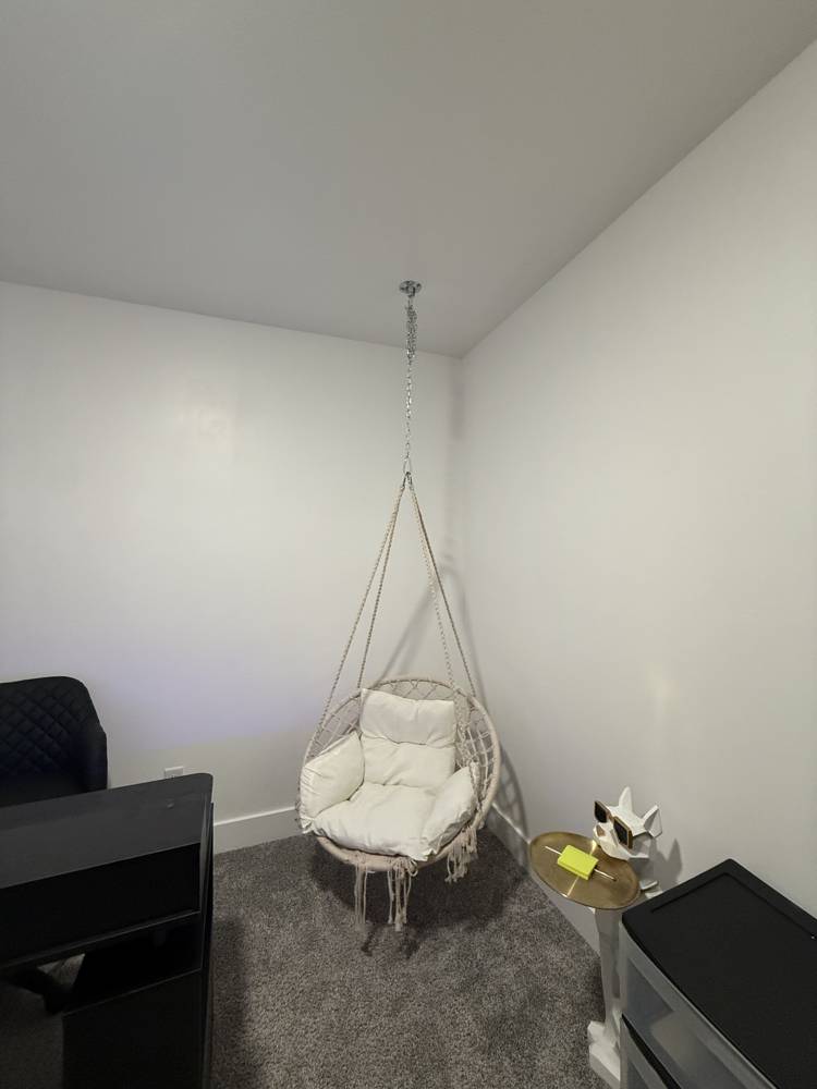 Hanging swing chair installed from the ceiling