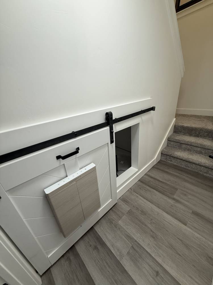 Barn door open to a hidden storage nook